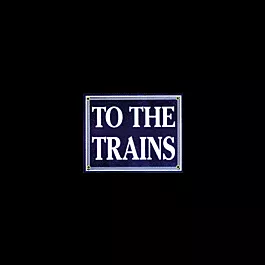 Railroad Sign -- "To The Trains"